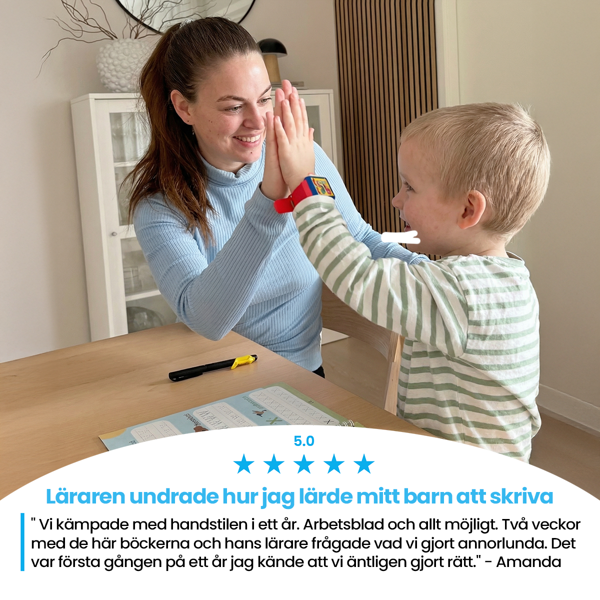 Mom and child high-five at the table, with a customer review
